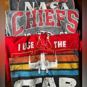 4 graphic t-shirt bundle, sizes between youth XL and adult small.